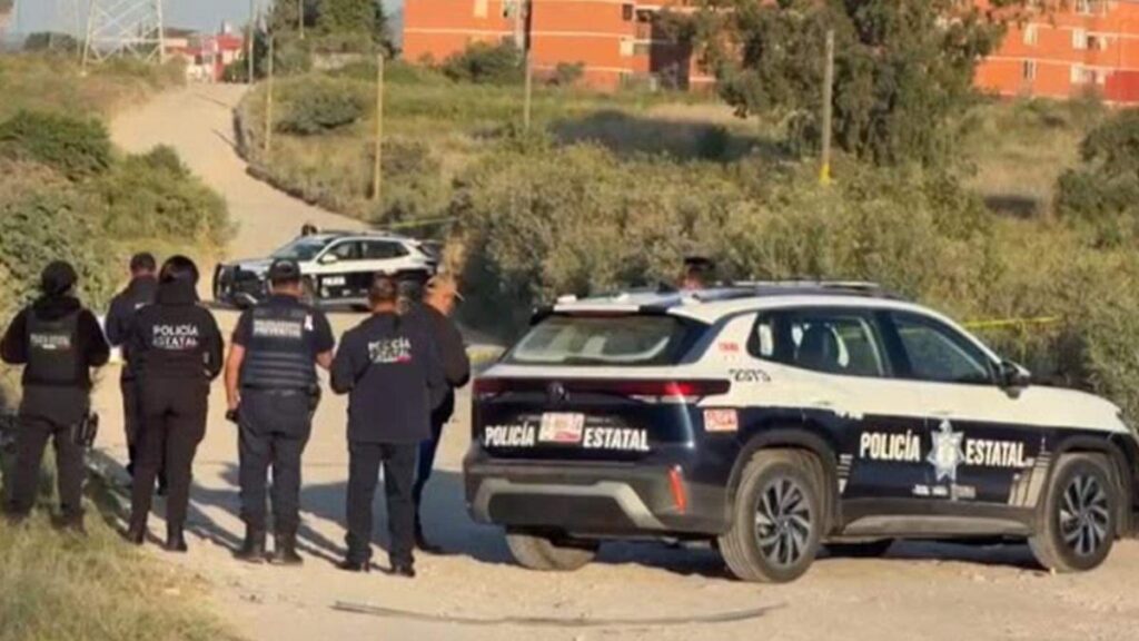Cinta amarilla de acordonamiento policial en la colonia Agrícola Villa Albertina donde fue hallado un hombre sin vida con las manos atadas